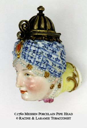 This pipe head in the Rococo style was made by Meissen about 1760. Courtesy Racine & Laramie Tobacconist