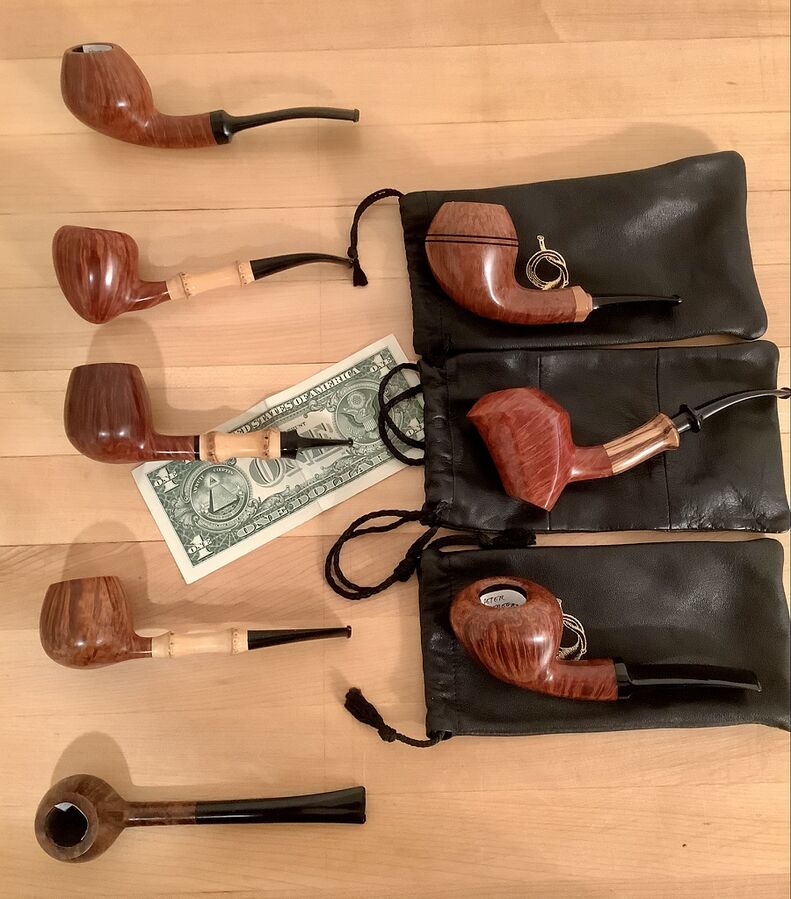 The pipes on the right are unsmoked. The pipes at the top of each column are Graded OP3, Hedegaard’s highest grade; the Prince shape pipe, bottom left, is graded R, the only one we have ever seen.